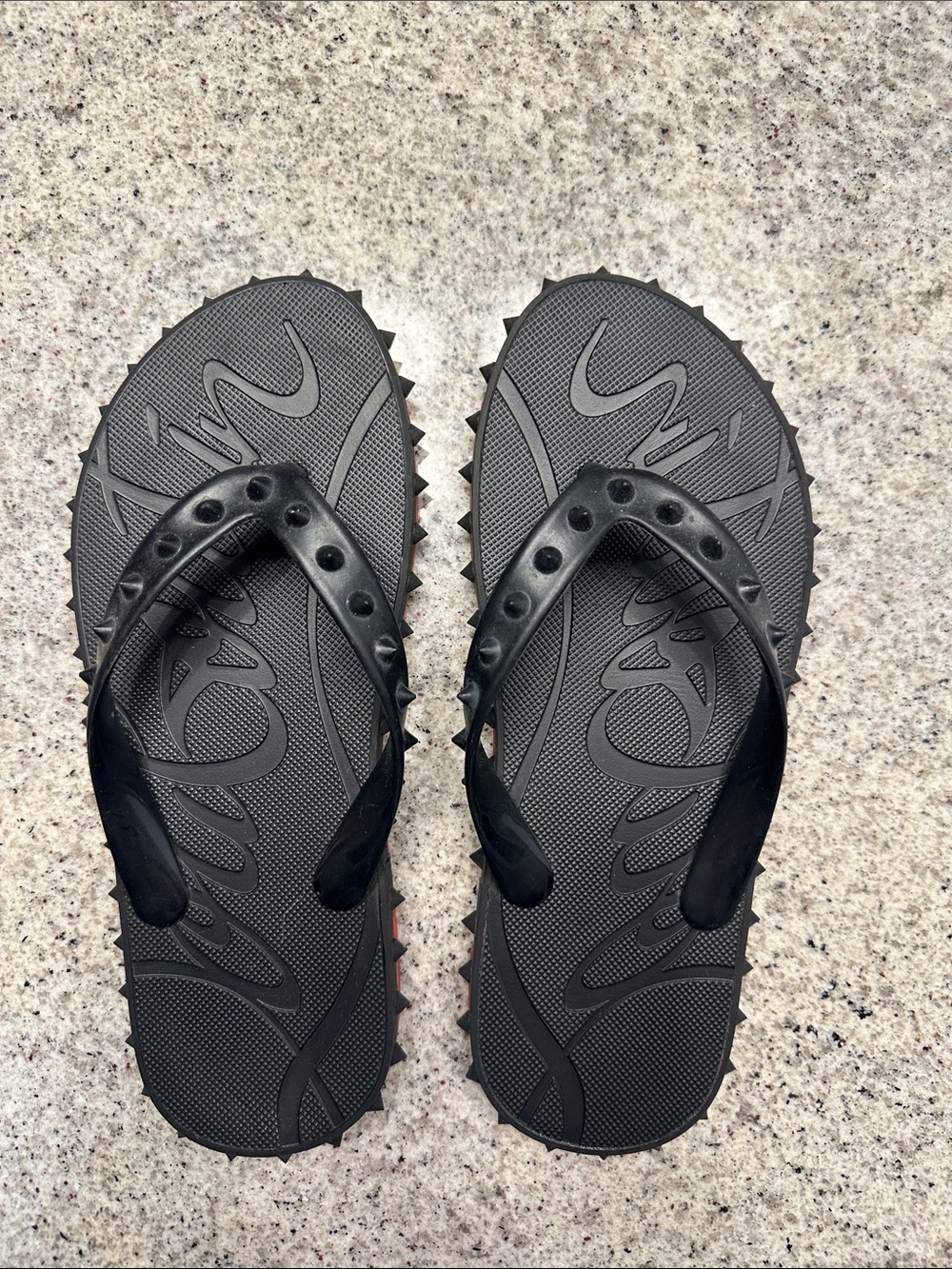 Women’s Black and red Spike-Trim Flip Flops